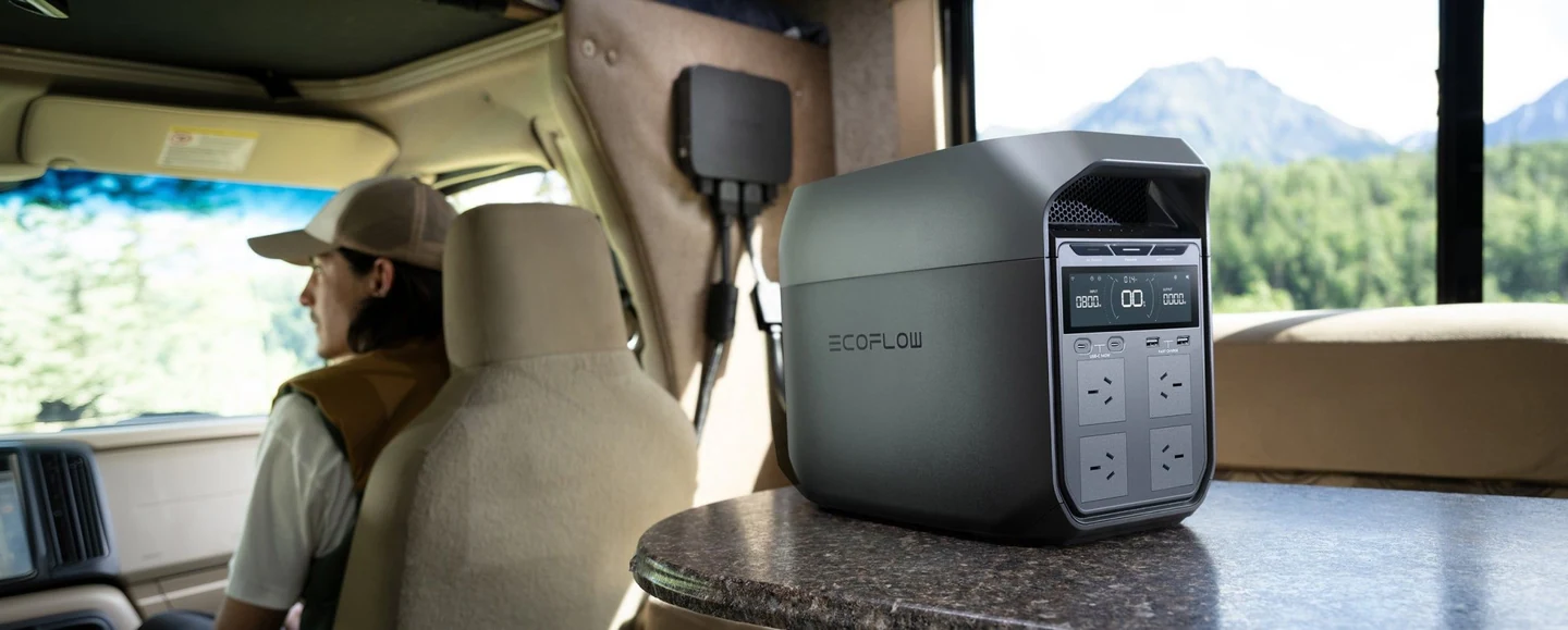 Official EcoFlow image of the Australian DELTA 3 on a camper counter, with mountain scenery through the window.